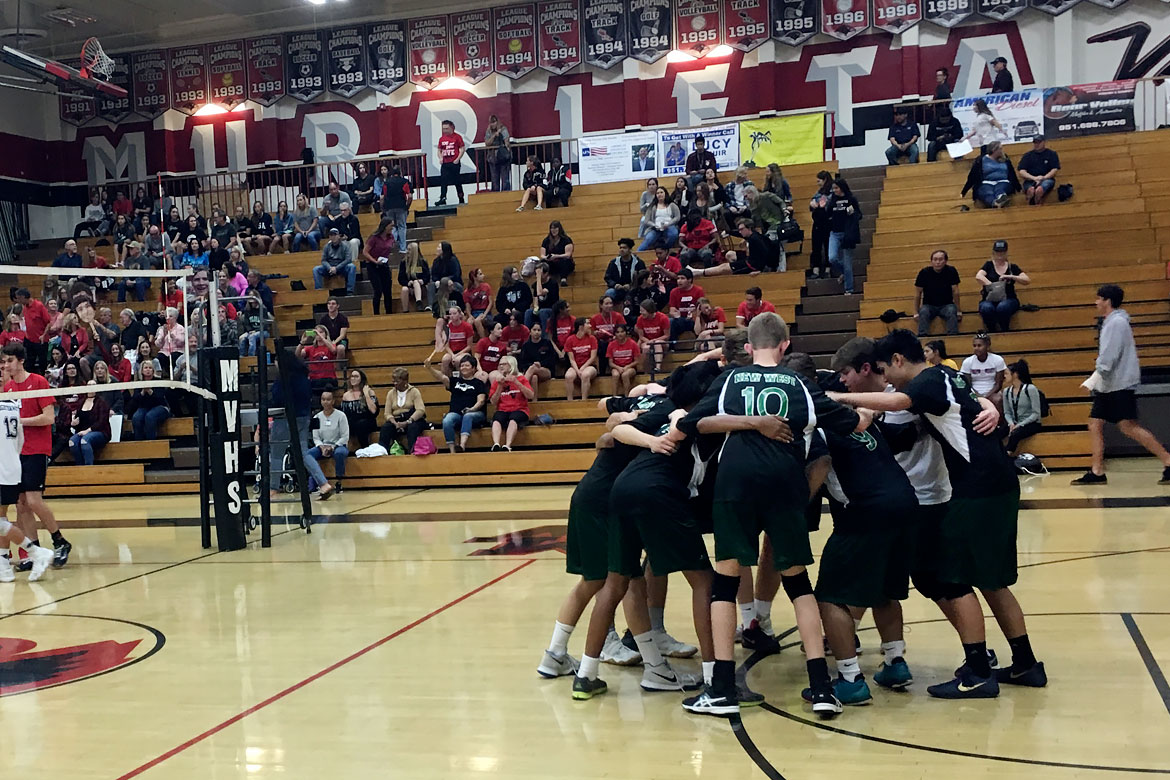 2018-04-boys-volleyball-huddle